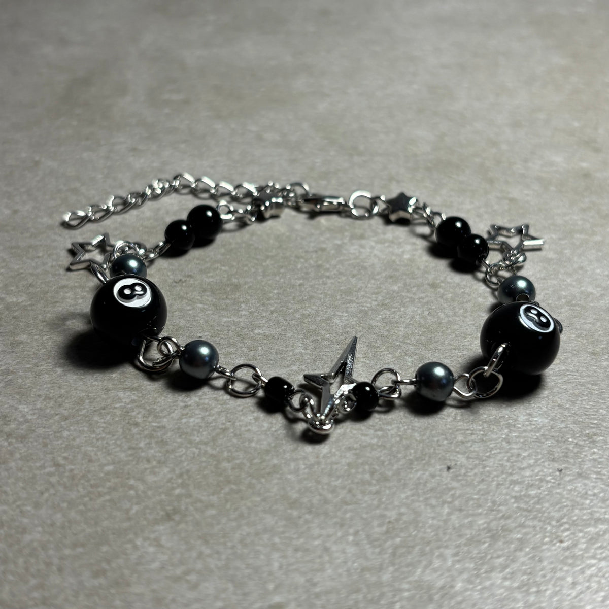 PULSERA BOLA 8 STARS