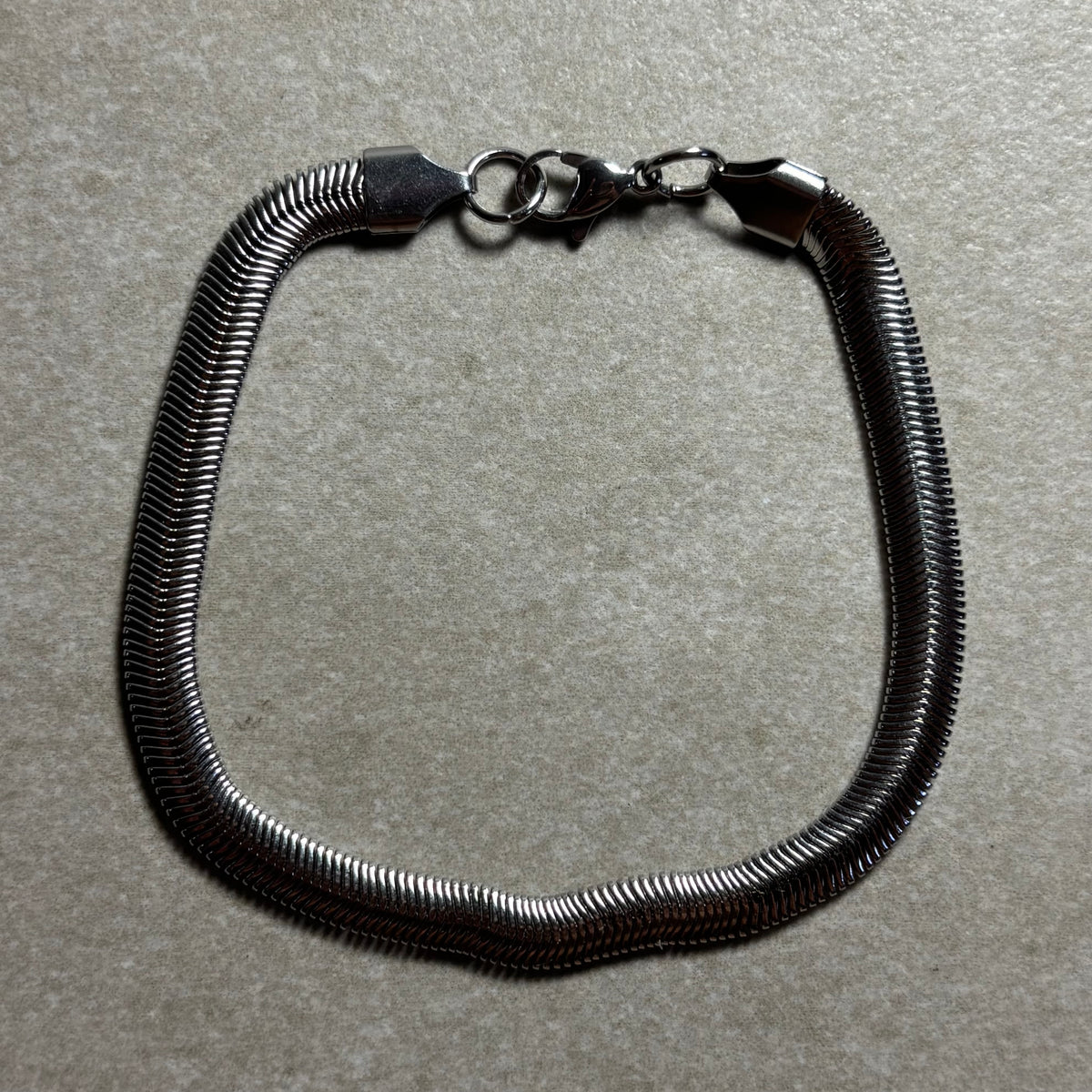 PULSERA RARE PLATEADA