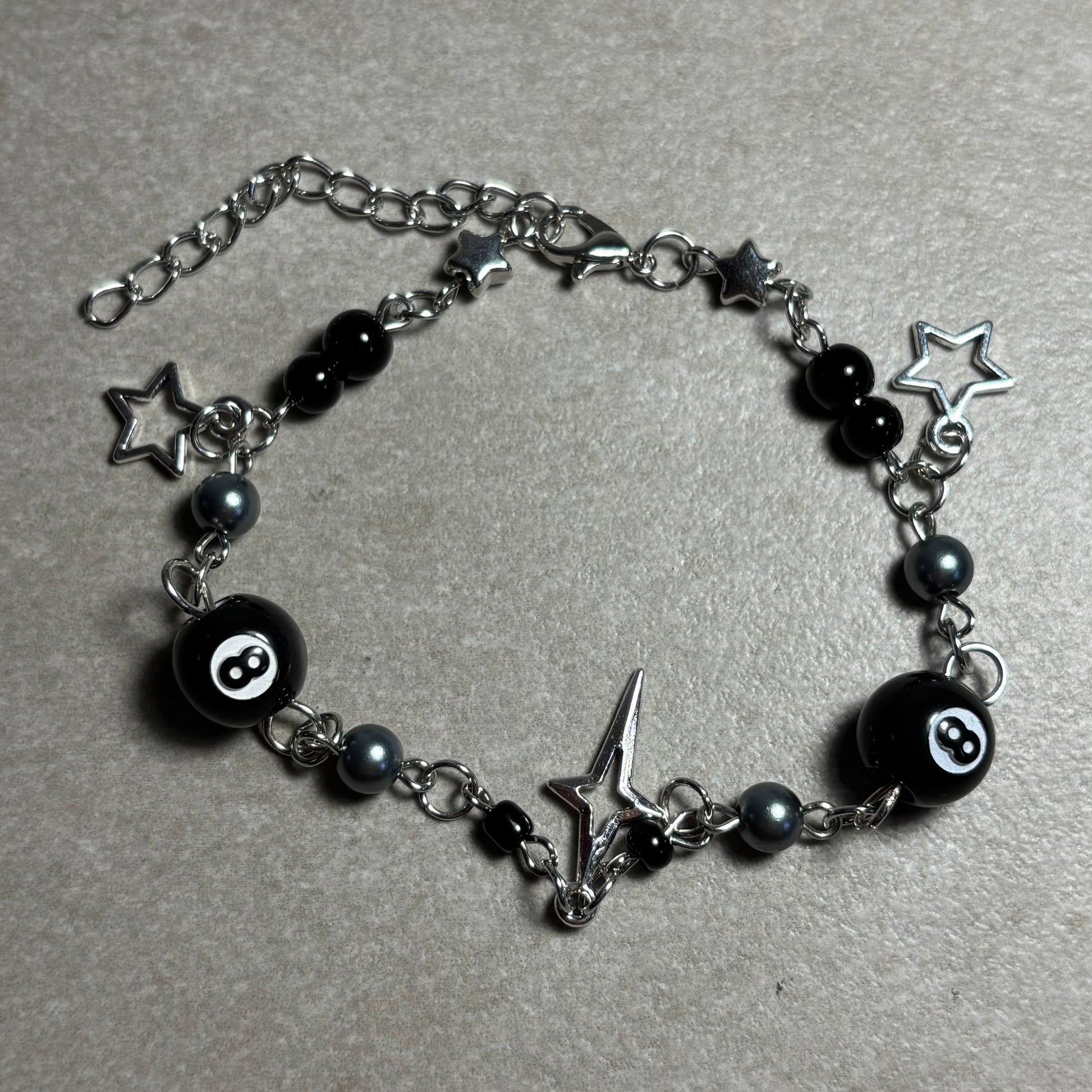 PULSERA BOLA 8 STARS